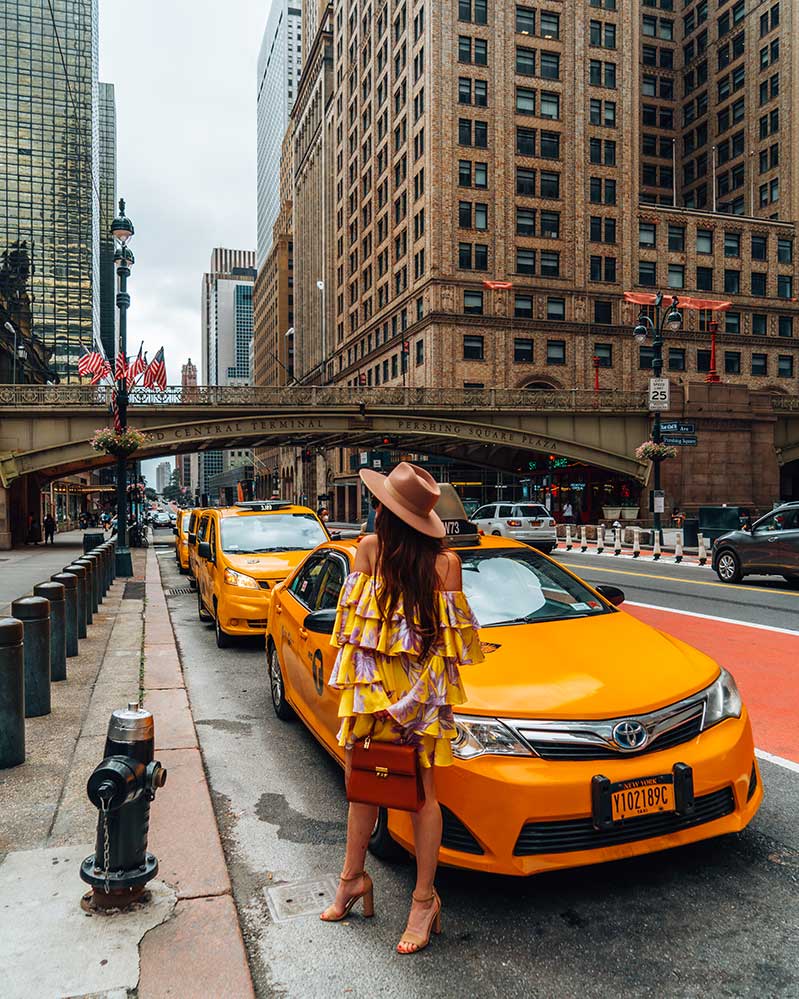 Kristi Hemric (Instagram: @khemric) finds a unique way to get a photo in NYC…use a taxi cab as a prop!!