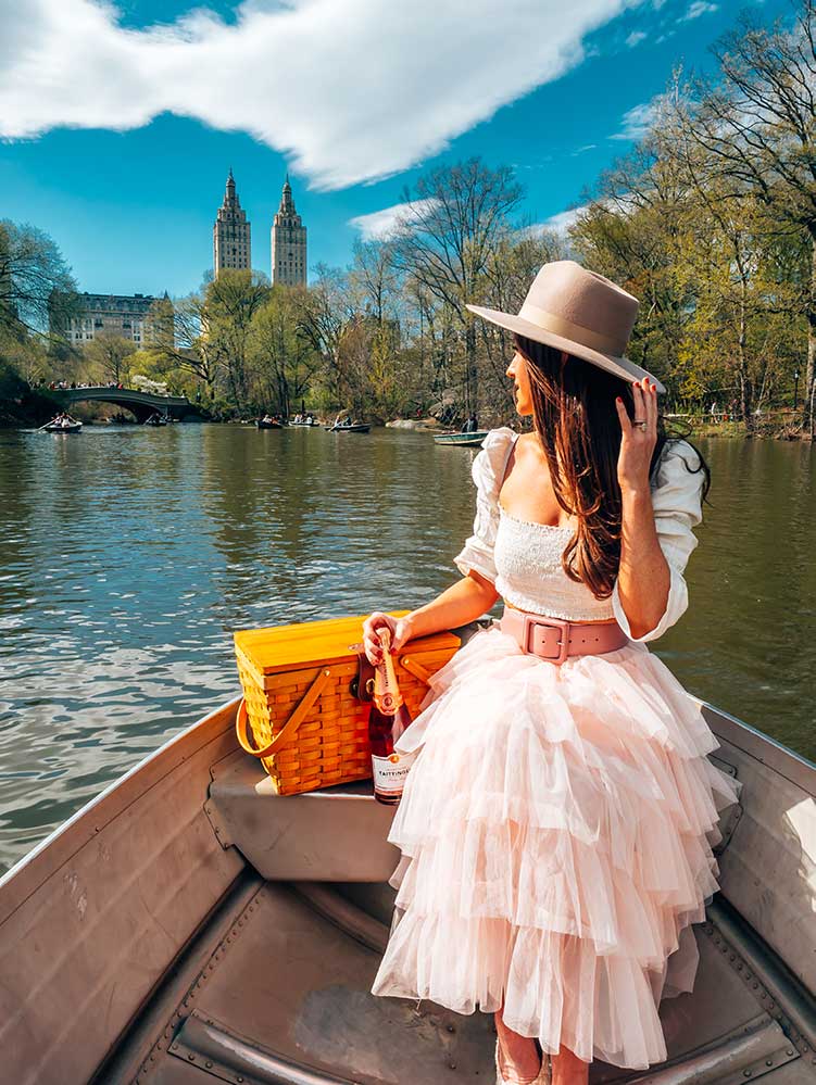 Kristi Hemric (Instagram: @khemric) enjoys a scenic row boat ride in The Lake at Central Park in New York City