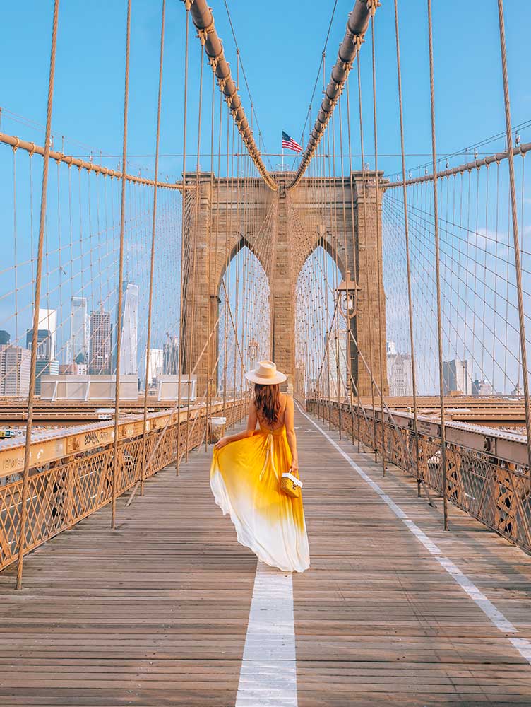 Kristi Hemric (Instagram: @khemric) takes in the sun on the picturesque Brooklyn Bridge in New York City