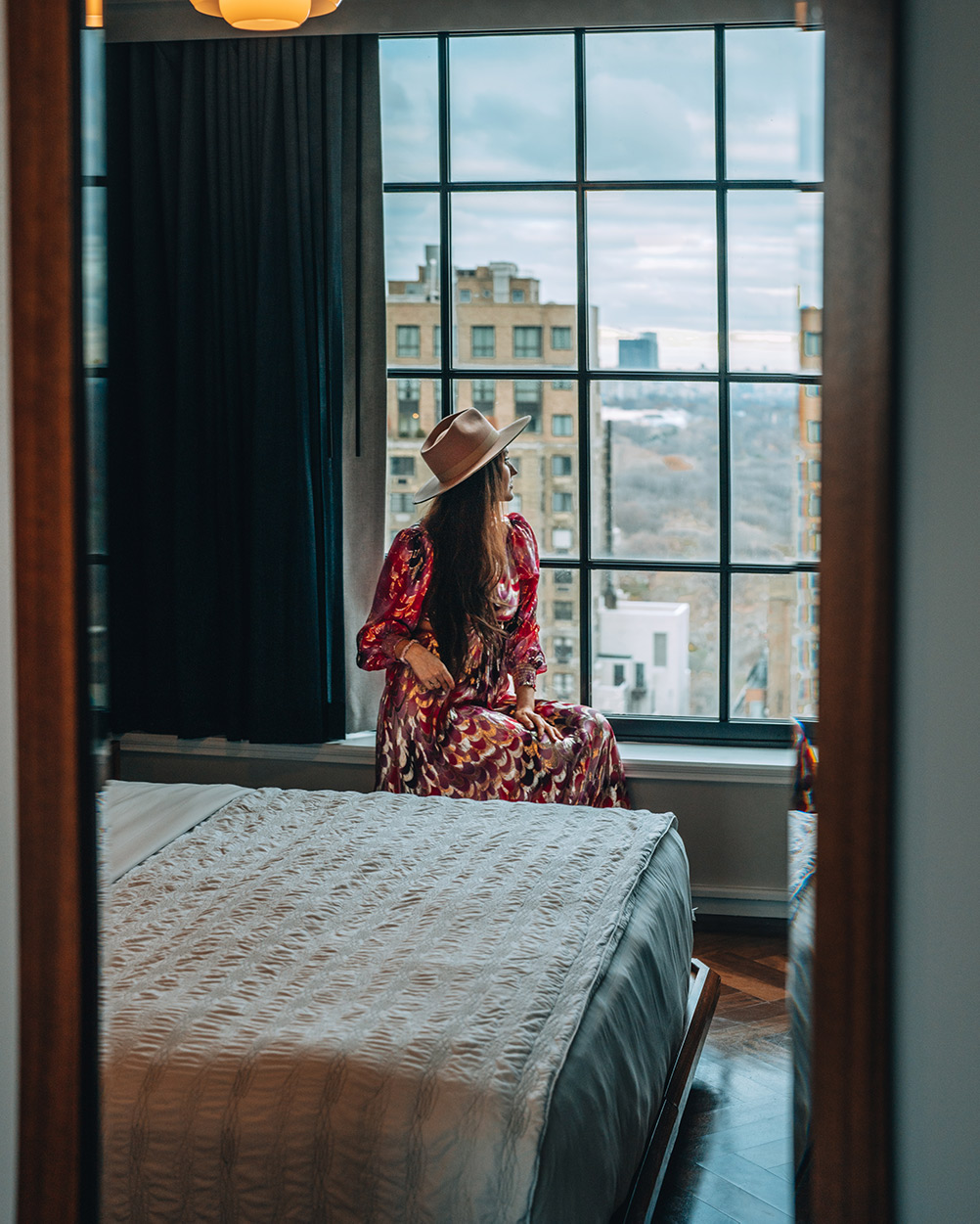 Kristi Hemric looking out on New York from a suite at Le Meridien